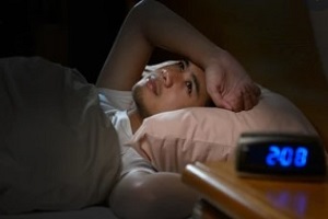 man cannot sleep at night due to insomnia needing cannabis strains